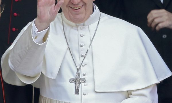 Newly elected Pope Francis, Cardinal Jorge Mario Bergoglio of Argentina waves as he leaves after praying at basilica in Rome