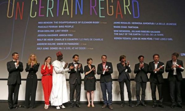 Director Kornel Mundruczo, winner of the Prize Un Certain Regard for his film "Feher isten", poses on stage during the 67th Cannes Film Festival in Cannes