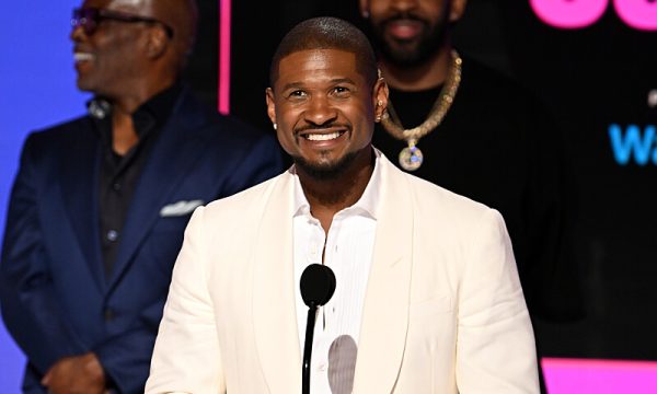 LOS ANGELES, CALIFORNIA - JUNE 30: Honoree Usher accepts the Lifetime Achievement Award onstage during the 2024 BET Awards at Peacock Theater on June 30, 2024 in Los Angeles, California. (Photo by Paras Griffin/Getty Images for BET)