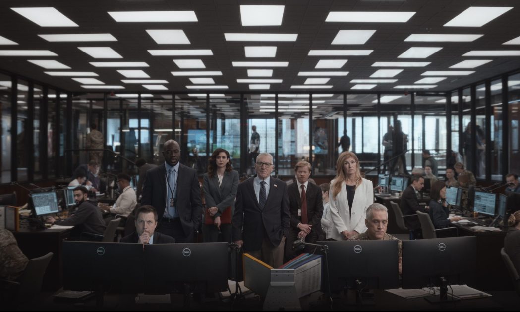 ZERO DAY. (L to R) McKinley Belcher III as Carl Otieno, Mozhan Navabi as Melissa Kornblau, Robert De Niro as George Mullen, Jesse Plemons as Roger Carlson and Connie Britton as Valerie Whitesell in Episode 102 of Zero Day. Cr. Courtesy of Netflix © 2024